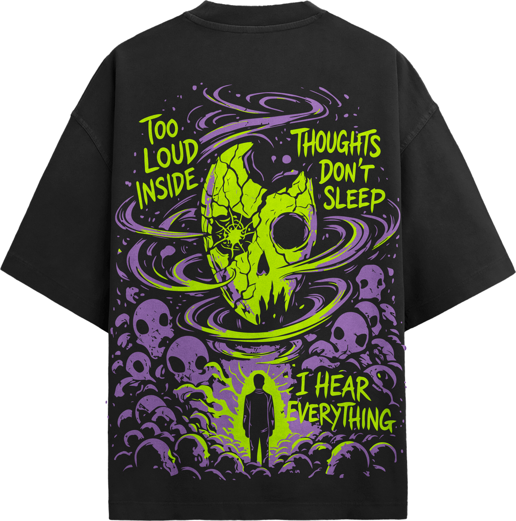 Back view of grey streetwear t-shirt featuring pink cracked skull, thought typography, and swirling blue vortex graphic.