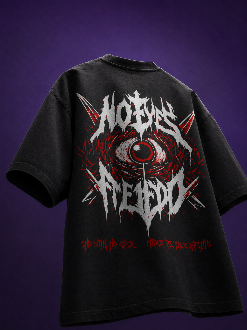 Back angle view of black oversized t-shirt showing detailed red eye occult artwork and gothic text print.
